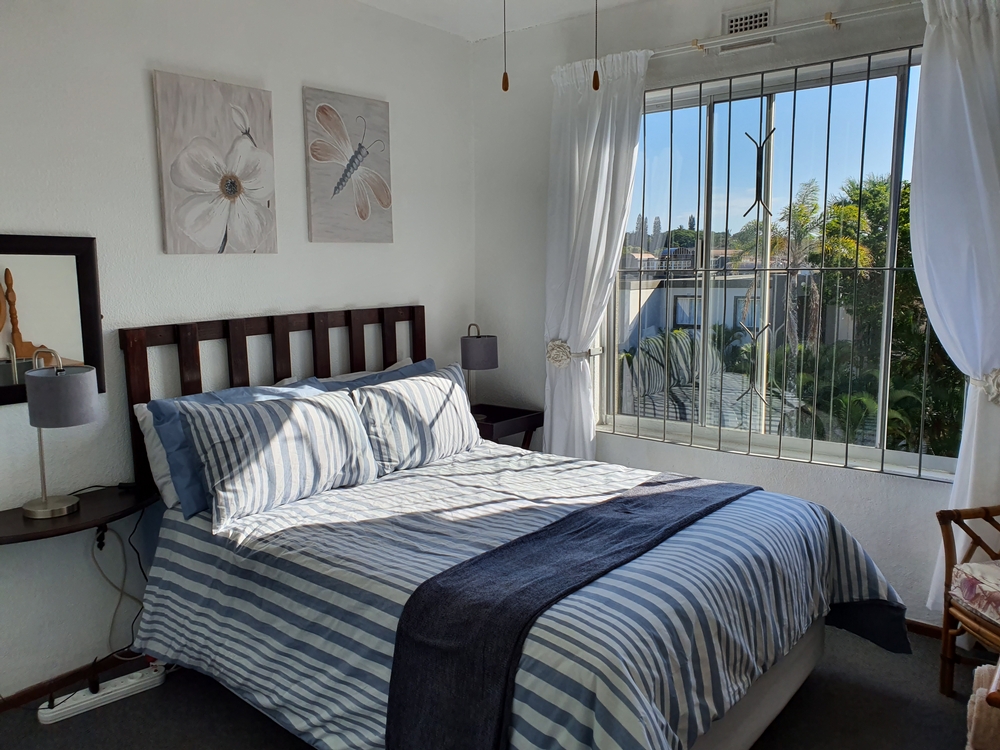 Laguna La Crete 173 Main bedroom with sea view and double bed